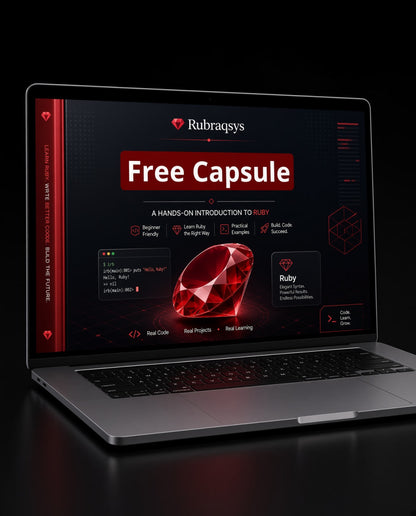 A silver laptop on a dark reflective surface displaying a promotional screen for Rubragsys and Ruby with a large red gem graphic and the text 'Free Capsule'.